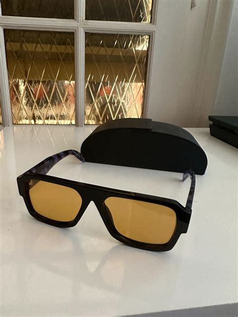 prada yellow tinted sunglasses|prada sunglasses price.